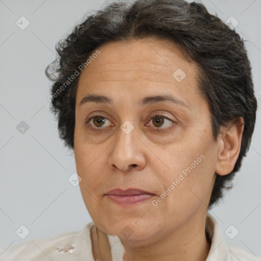 Joyful white adult female with short  brown hair and brown eyes