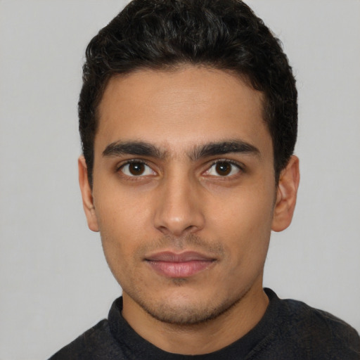 Neutral latino young-adult male with short  brown hair and brown eyes