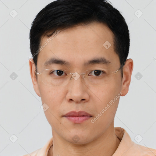 Neutral asian young-adult male with short  brown hair and brown eyes