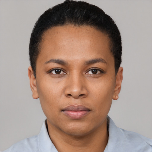 Neutral latino young-adult female with short  black hair and brown eyes