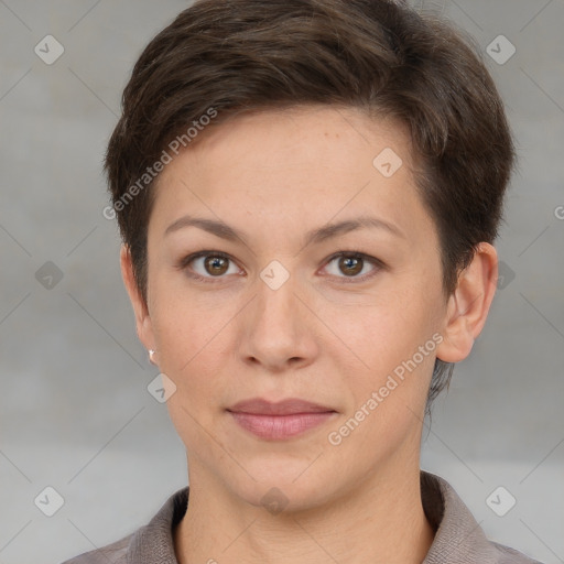 Joyful white young-adult female with short  brown hair and grey eyes