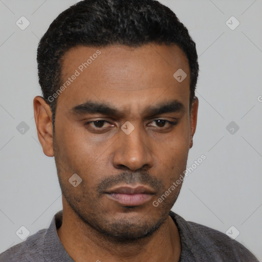 Neutral latino young-adult male with short  black hair and brown eyes