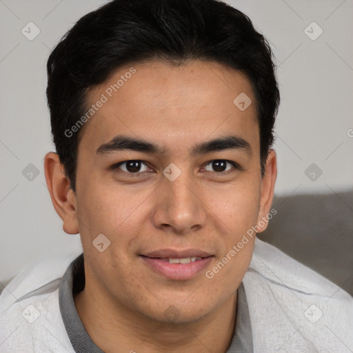 Joyful latino young-adult male with short  brown hair and brown eyes