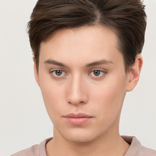 Neutral white young-adult female with short  brown hair and brown eyes