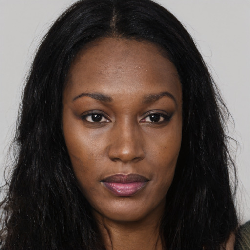 Joyful asian young-adult female with long  black hair and brown eyes