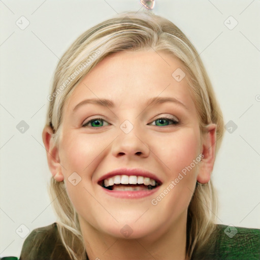 Joyful white young-adult female with medium  brown hair and green eyes