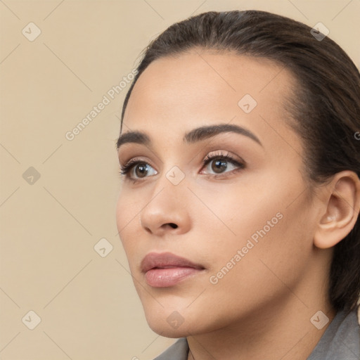 Neutral white young-adult female with medium  brown hair and brown eyes