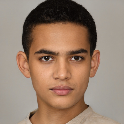Neutral latino young-adult male with short  brown hair and brown eyes