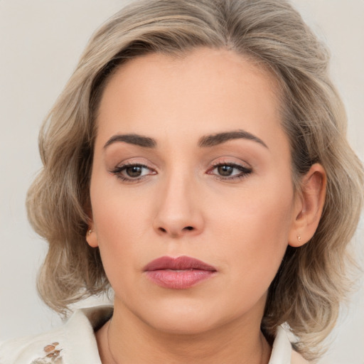 Neutral white young-adult female with medium  brown hair and brown eyes