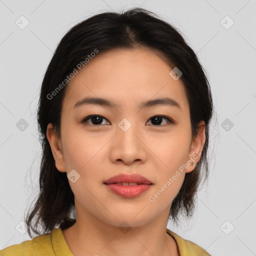 Joyful asian young-adult female with medium  brown hair and brown eyes