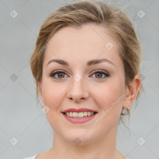 Joyful white young-adult female with medium  brown hair and blue eyes