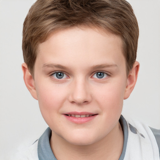 Joyful white child female with short  brown hair and grey eyes