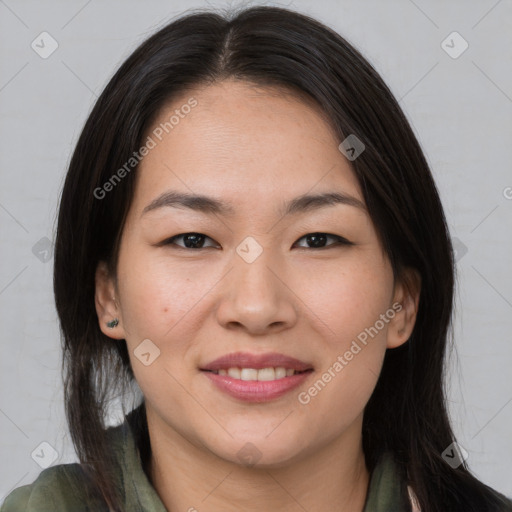 Joyful asian young-adult female with medium  brown hair and brown eyes