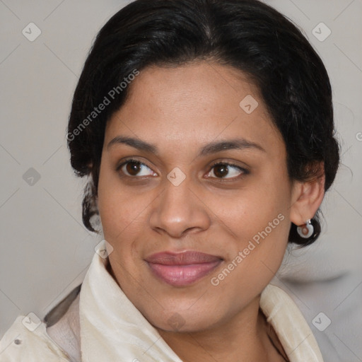 Joyful latino young-adult female with medium  brown hair and brown eyes