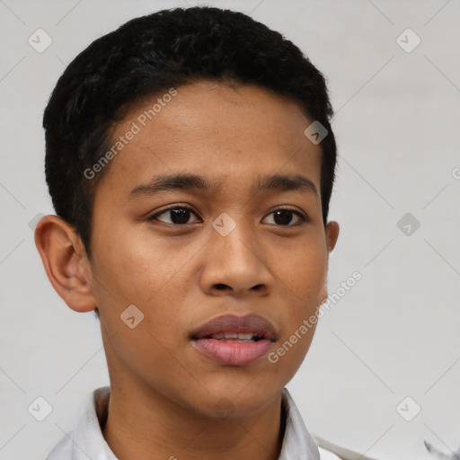 Joyful latino young-adult male with short  brown hair and brown eyes