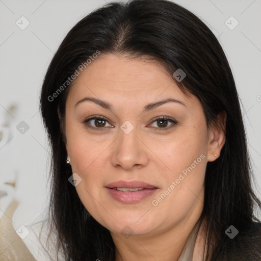 Joyful white adult female with long  brown hair and brown eyes