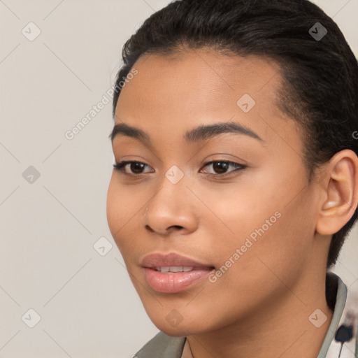 Joyful latino young-adult female with short  brown hair and brown eyes