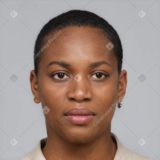 Joyful black young-adult female with short  brown hair and brown eyes