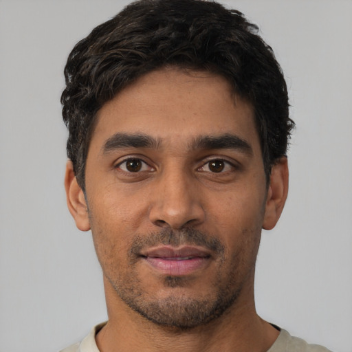 Neutral white young-adult male with short  black hair and brown eyes