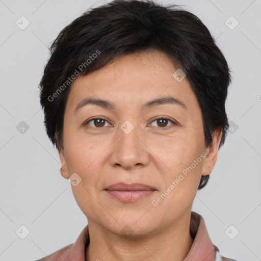 Joyful white adult female with short  brown hair and brown eyes