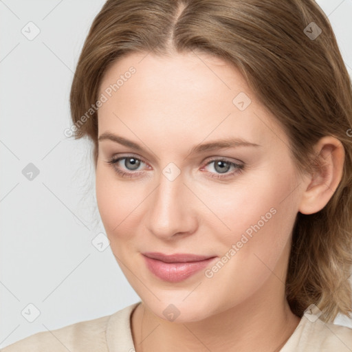 Joyful white young-adult female with medium  brown hair and blue eyes