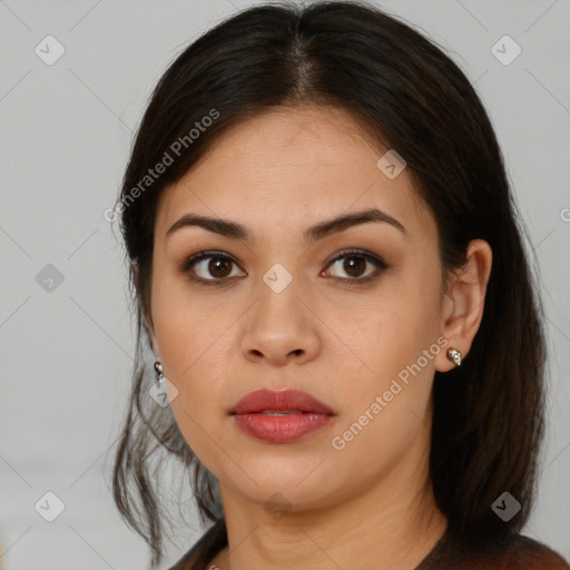 Neutral latino young-adult female with medium  brown hair and brown eyes