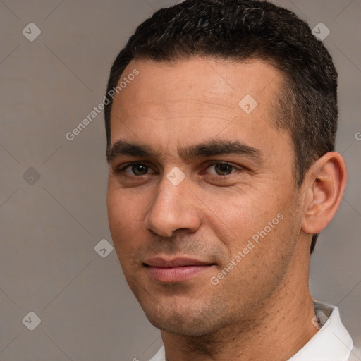 Joyful white young-adult male with short  brown hair and brown eyes