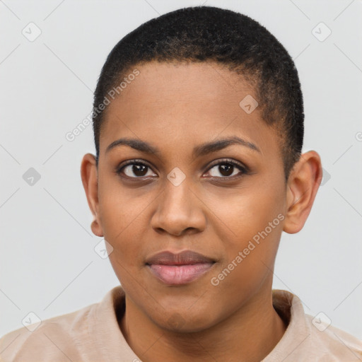 Joyful black young-adult female with short  brown hair and brown eyes