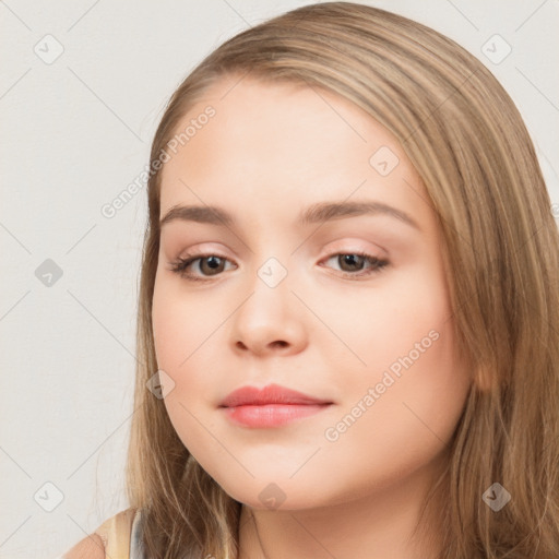 Neutral white young-adult female with long  brown hair and brown eyes