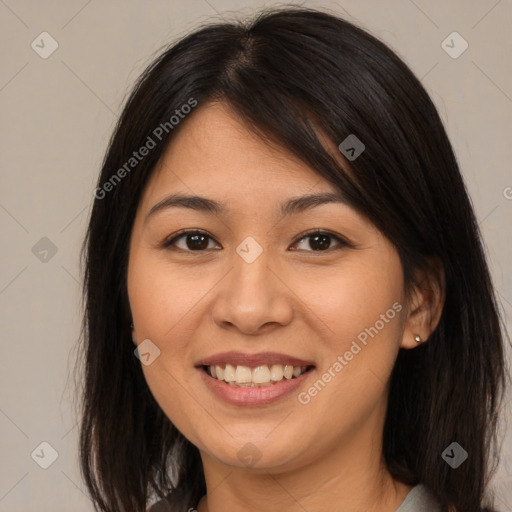 Joyful asian young-adult female with long  brown hair and brown eyes