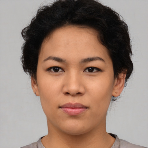 Neutral asian young-adult female with short  brown hair and brown eyes