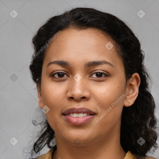 Joyful latino young-adult female with medium  brown hair and brown eyes