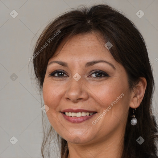 Joyful white adult female with medium  brown hair and brown eyes