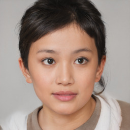 Neutral asian young-adult female with medium  brown hair and brown eyes