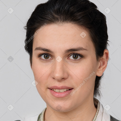 Joyful white young-adult female with medium  brown hair and brown eyes