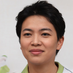 Joyful asian young-adult female with short  brown hair and brown eyes