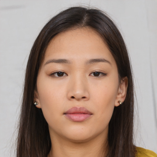 Neutral asian young-adult female with long  brown hair and brown eyes