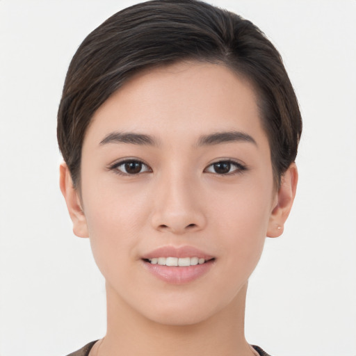 Joyful asian young-adult female with short  brown hair and brown eyes