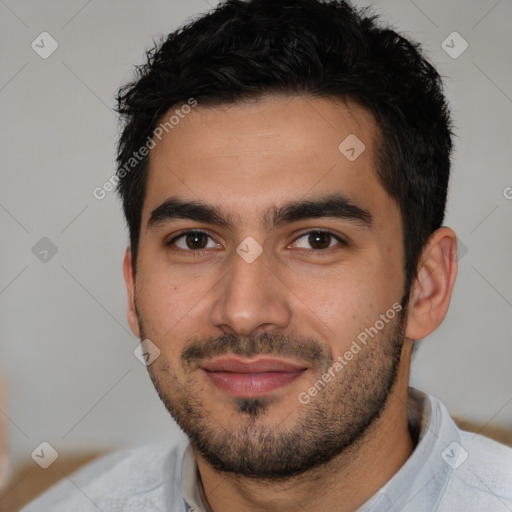 Joyful white young-adult male with short  black hair and brown eyes