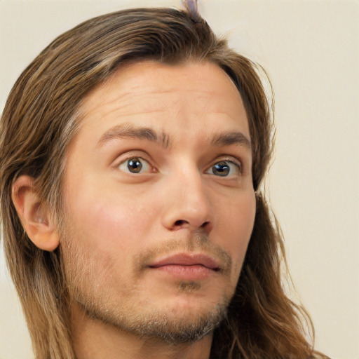 Neutral white adult male with long  brown hair and brown eyes