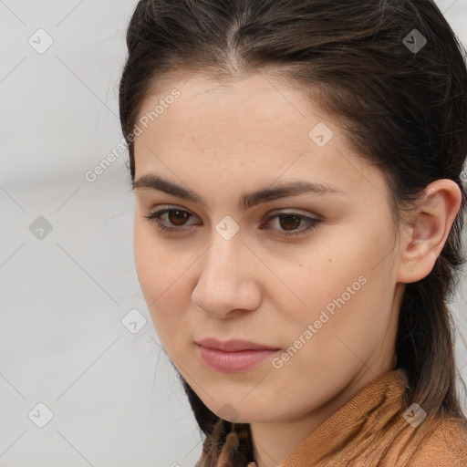 Neutral white young-adult female with long  brown hair and brown eyes