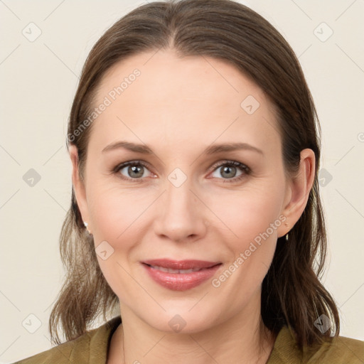 Joyful white young-adult female with medium  brown hair and brown eyes