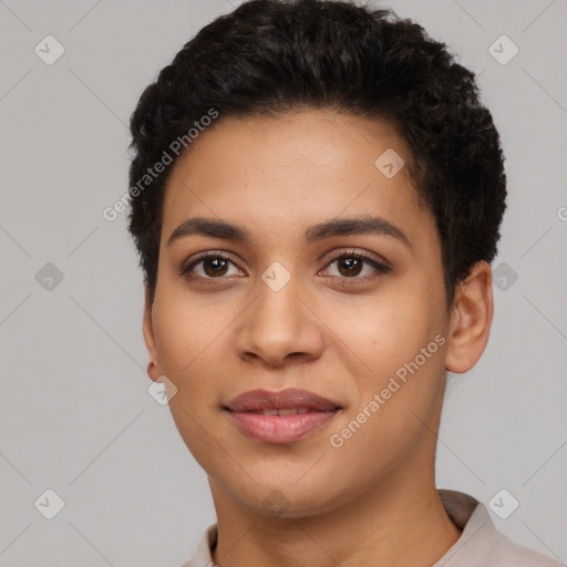 Joyful latino young-adult female with short  black hair and brown eyes