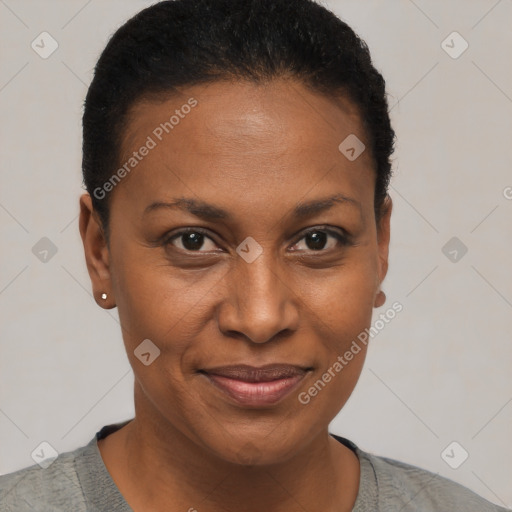 Joyful black young-adult female with short  brown hair and brown eyes