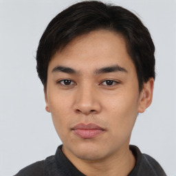 Neutral asian young-adult male with short  brown hair and brown eyes