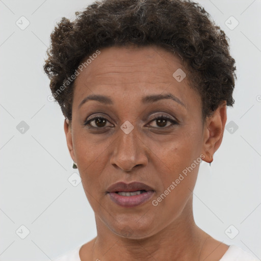 Joyful white adult female with short  brown hair and brown eyes