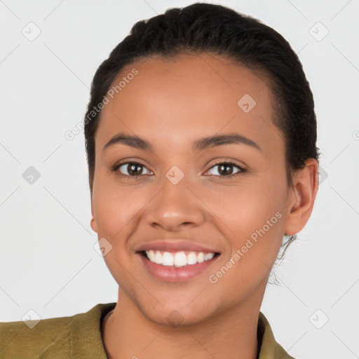 Joyful white young-adult female with short  brown hair and brown eyes