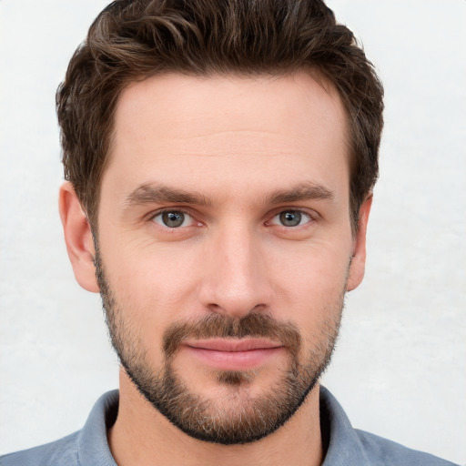 Neutral white young-adult male with short  brown hair and grey eyes