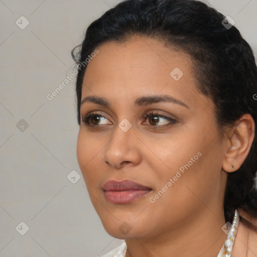 Joyful latino young-adult female with short  brown hair and brown eyes