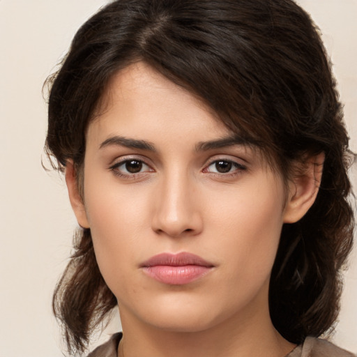 Neutral white young-adult female with medium  brown hair and brown eyes